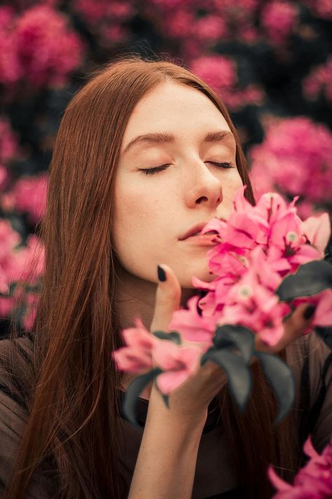 Close-up shot of woman with curly hair smelling pink flowers Pose With Flowers, Ways To Pose, Smelling Flowers, Perspective Photography, Half Face Mask, Essential Oils For Hair, Grow Hair Faster, Eye Cover, Stimulate Hair Growth