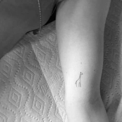 Minimalist giraffe tattoo on the left inner arm. Grandma loved giraffes Minimalist Giraffe Tattoo, Baby Giraffe Tattoo, Small Giraffe Tattoo, Giraffe Tattoo, Tatoo Dog, Africa Tattoos, Inner Arm Tattoos, Inspiration Tattoos, Forearm Tattoo Women