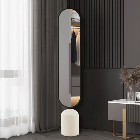 This floor standing mirror is designed by combining an oval mirror and a white cylindrical base. The large and high-definition glass mirror, combined with high-quality iron frame and base, perfectly presents an elegant and practical floor mirror. It is suitable for living room, bedroom, dining room, entrance and any space, and can be perfectly adapted to various styles. Oval Long Mirror, Modern Floor Standing Mirror, Front Entrance Mirror, Standing Floor Mirror, Entrance Mirror, Mirror Room Divider, Floor Standing Mirror, Black And White Living Room, Big Mirror