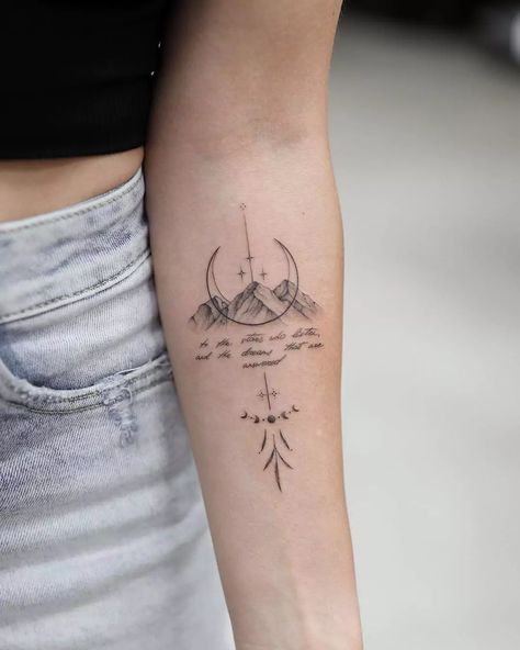 86 Stunning Mountain Tattoos For Both Men and Women In 2024 Back Of Arm Nature Tattoo, Dainty Mountain Tattoos For Women, Road Trip Tattoo Ideas, Fun Tattoos For Women, Hiking Tattoos For Women, Wander Tattoo, Nepal Tattoo, Moutain Tattoos, Small Nature Tattoo