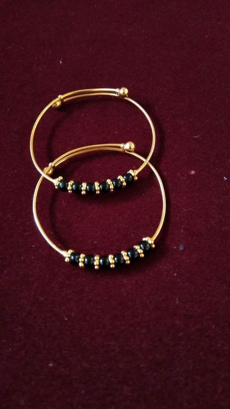 Gold baby bangles designs Baby Jewelry Gold, Kids Gold Jewelry, New Gold Jewellery Designs, Baby Bangles, Beautiful Gold Necklaces, Gold Mangalsutra Designs, Gold Bridal Jewellery Sets, Black Beaded Bracelets, Antique Bridal Jewelry