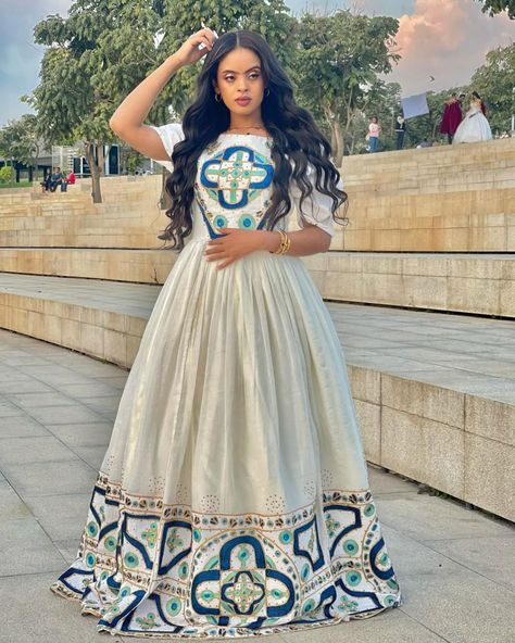 From traditional elegance to modern chic, EthiopianClothing.net has it all! 🌺 Explore the colors, embrace the patterns, and make a statement with our unique pieces. Your wardrobe deserves this upgrade. አዳዲስ ልብስ ለማግኘት ቴሌግራም ቻናላችንን  ይቀላቀሉ፡፡ 👉 https://t.me/menendress ይደውሉልን/መልእክት ይላኩልን +251938057705/ +251913040753 #Ethiopianclothing #habeshakemis #eritreanbeauty #Africanfashion #Eritreans Traditional Maxi Dress With Intricate Embroidery For Ceremonies, Traditional Maxi Dress With Intricate Embroidery For Festivals, Traditional Embroidered Maxi Dress For Transitional Season, Traditional Embroidered Transitional Maxi Dress, Traditional Transitional Embroidered Maxi Dress, Transitional Traditional Embroidered Maxi Dress, Traditional Floor-length Maxi Dress With Intricate Embroidery, Floor-length Pearl Embroidered Dress For Eid, Traditional Floor-length Dress With Pearl Embroidery