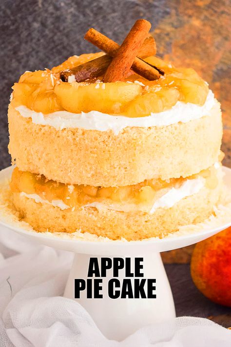 Indulge in this apple pie cake from scratch which is perfect for Fall and Thanksgiving. It can be made with a cake mix too. This is a spiced layer cake is filled with pie filling and buttercream frosting. The decoration is kept simple and rustic with cinnamon sticks and white chocolate curls. Cake With Pie Filling, Apple Pie Cake Recipe, Pie Cake Recipe, White Chocolate Curls, Gooey Desserts, Cake Recipe From Scratch, Cinnamon Pie, Apple Pie Cake, Mouthwatering Desserts