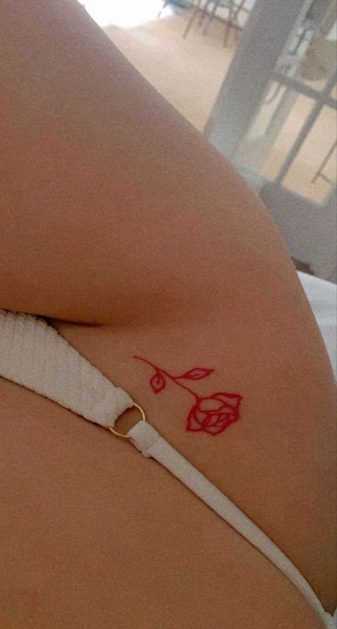 Red Rose On Back Tattoo, Red Ink Tattoos Hip, Red Hip Tattoos Women, Red Tattoo On Hip, Red Ink Hip Tattoo, Red Heart Tattoo On Bum Cheek, Hip Rose Tattoos Women, Back Tattoo Women Red Ink, Small Red Ink Tattoos For Women