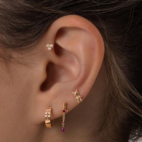 Combining cute and bold 🧸🗡️💥 15% off on all items now Outer Conch Piercing, Earring Cartilage, Anti Tragus, Tragus Conch, Forward Helix, Floral Studs, Tragus, Real Diamonds, Conch