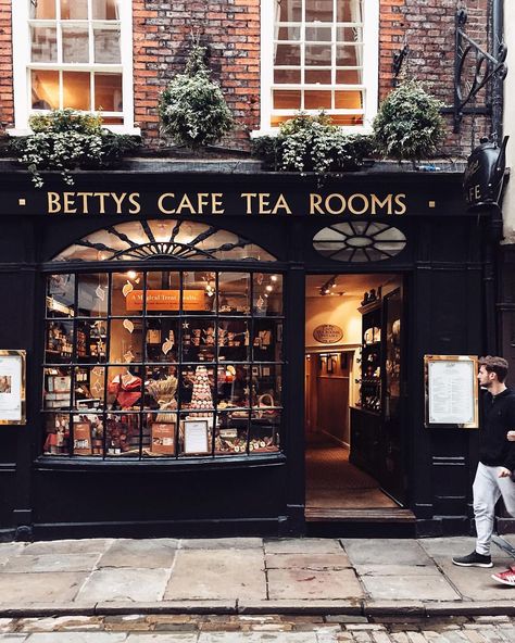 Frosty cold. Church bells ringing. Branches tapping against the window. It turns 10am on Christmas Day and I’m at my grandparents cottage… Bettys Tea Room, Home Spa Room, Calendar December, Library Cafe, London Tea, Tea Rooms, Visiting England, Spa Room, Shop Fronts