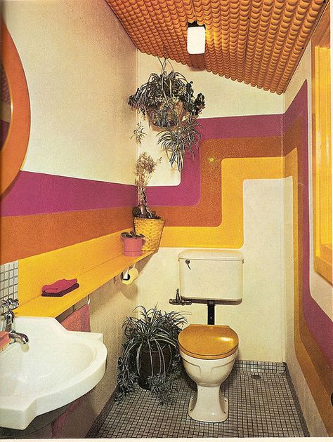 1970s: Cloakroom with ever-popular pine wood panelled ceiling, pine toilet seat, spider plants and stylised wall design. Rainbow Rooms, 70s Interior Design, 70s House, 70s Interior, Retro Interior Design, 70s Home, 70s Decor, 70s Home Decor, Deco Retro