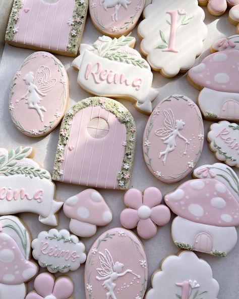 Who wants to go thru that door to join a fairy party!!?! Meee 🧚🏻. Happy 1st birthday Reims!! I was just making your baby shower cookies last year. Hope I will be making you cookies every year!! ❤️ #fairycookies #fairyparty #fairybirthday Woodland Fairy Cookies Decorated, Fairy 1st Birthday Cookies, A Little Fairy Is On Her Way, Fairy Decorated Cookies, Fairy Party Cookies, Fairy Birthday Treats, Fairy Theme Cookies, Fairy Third Birthday, Fairy Birthday Cookies