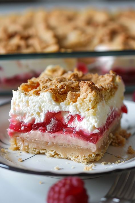 Rhubarb Pudding Bars: A Springtime Delight Layered Rhubarb Pudding Dessert, Layered Rhubarb Dessert, Rhubarb Pudding Bars, Rhubarb Delight Recipe, Rhubarb Trifle, Graham Wafer Crust, Pudding Bars, Rhubarb Dream Bars, Pudding Bar