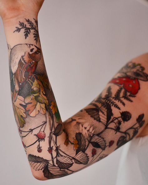 Polish tattoo artist Joanna Świrska (previously) stipples fur and inks subtle gradients to create fanciful scenarios of backpack-wearing kangaroos, cycling cats, and whimsical masses of tangled flora and fauna. Working as Dzo Lama, Świrska is known for her delicate illustrations that mix playful ele Tattoos Delicate, Maine Nature, Nature Sleeve, Polish Tattoos, Whimsical Tattoos, Christian Sleeve Tattoo, Forest Tattoos, Theme Tattoo, Back Of Shoulder Tattoo