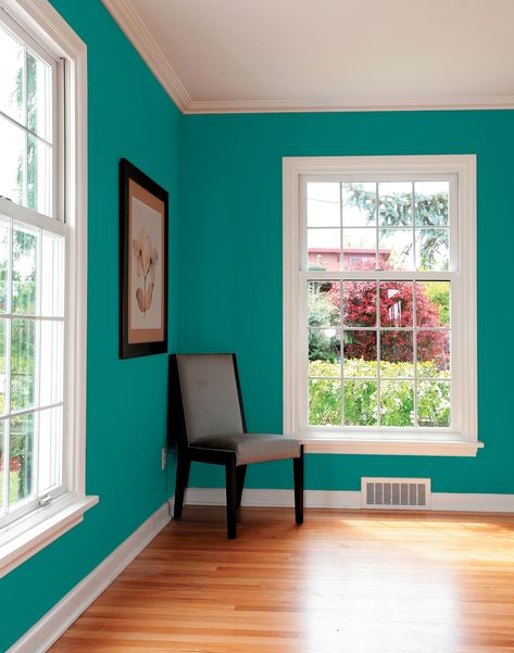 This delicious tropical deep-toned aqua is a lovely color for a dining room or as an overall tropical exterior tone.  Makes a stunning color in a powder room or as an accent wall in a sitting room or bedroom.  Pair with white trim and use magenta, coral and gold accents. View this Glidden paint color, and picture it in your home at https://www.glidden.com/colors/blue-teal/romantic-isle Glidden Paint, Room Color Combination, Wall Color Combination, Dining Room Paint Colors, Living Room Wall Color, Room Wall Colors, House Paint Interior, Dining Room Paint, Bedroom Wall Paint