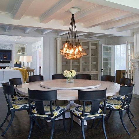 Love this incredible 9' dining table that fits 12!! The custom chandelier is beautiful too! Image courtest of @susana.chango - Remembering that summer home where I was asked to design a round table big enough to fit a party of 12 and what followed was a few months of hilarious engineering exercises with my furniture maker. Good news is if anyone ever needs a 9' round table you can come to me. {Questions anticipated- the chandelier is custom}. #diningroom #interiordesign #design #desgner #interio Big Round Dining Table, Dining Table Lazy Susan, Table Lazy Susan, Large Round Dining Table, Large Round Table, Round Dining Room Table, House Dining Room, Round Dining Room, Stunning Interior Design