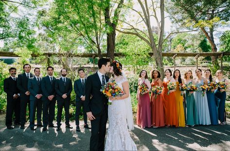 Rainbow bridesmaids Multicolor Wedding Party, Wedding Party Mixed Colors, Multicolor Bridal Party, Multi Color Groomsmen Attire, Bridesmaid Dresses Mismatched Bright Colors, Rainbow Wedding Groomsmen, Rainbow Bridesmaid Bouquet, Muted Rainbow Wedding Bridesmaids, Rainbow Bridesmaid Dresses