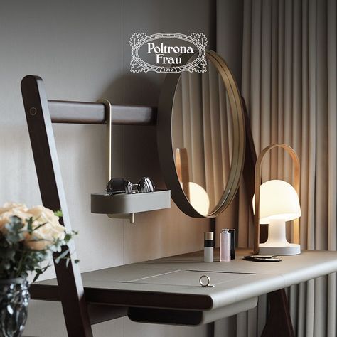 A corner to relax and treat yourself before going to bed. The Ren dressing table is part of a furniture accessory collection which is the result of studies by Neri & Hu for Poltrona Frau. It features a round mirror, an oval tray and a top with a lift-up compartment to store your beauty products. ​ Mirror Clothes, Neri Hu, Key Tray, Dressing Table Design, Poltrona Frau, Modern Entryway, Oval Tray, Clothes Rack, Entrance Hall