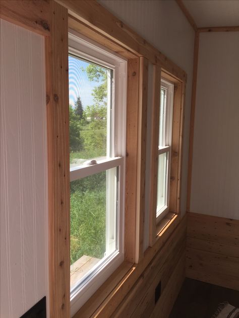 Interior home office suite with reclaimed lumber and rustic cedar trim. Cedar Trim Interior, Natural Wood Window Trim, Cedar Trim Interior Wood, Cedar Window Trim, Woodlands Bedroom, Window Trim Interior, Cottage Trim, Rustic Trim, Knotty Pine Trim