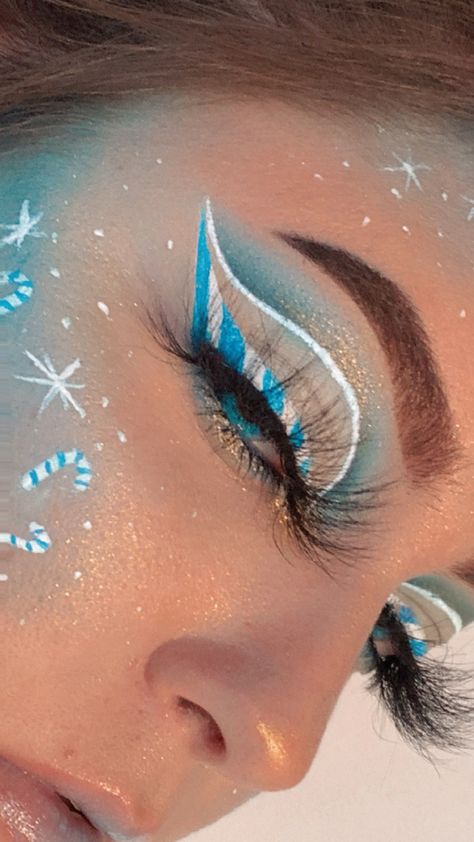 Winter Themed Makeup Looks, Snowflake Graphic Liner, Blue Christmas Eye Makeup, Blue Christmas Makeup Looks, Ice Blue Makeup Look, Snowman Makeup Looks, Christmas Creative Makeup, Snowflake Eyeliner, Blue Christmas Makeup