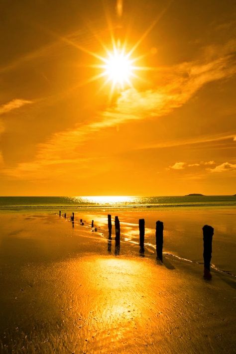 Golden sunshine over the beach breakers and blue Atlantic sea in Youghal County, Cork Ireland on a summers day. Amazing Sunsets, Wallpaper Vintage, Beautiful Sunrise, Beautiful Sky, Beautiful Sunset, The Sand, Beach Life, Sunrise Sunset, Beautiful World