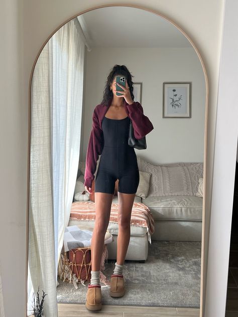 Jumpsuit Romper Outfit Casual, Romper Casual Outfit, One Piece Outfits Jumpsuit, Body Suit With Uggs, Outfits With Tazz Slippers, Athletic One Piece Outfit, Body Suit Romper Outfits, How To Style A One Piece Bodysuit, Yoga Romper Outfit