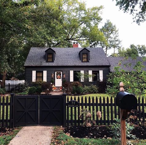 12 Farmhouse Exterior Paint Colors for a Classic Look | Hunker Farmhouse Exterior Colors, Black Houses, Elsie De Wolfe, Dark House, Hauntingly Beautiful, Black House Exterior, Farmhouse Exterior, House Paint Exterior, Exterior Paint Colors