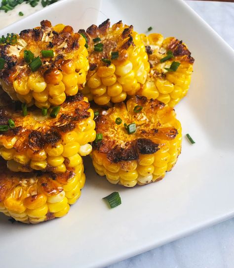 Try this fun recipe idea for a corn on the cob appetizer. Cut the corn into rings, brush with seasoned butter, and bake in the oven for a fun little twist. Corn Recipes Side Dishes, Corn Fritter Recipes, Spiced Butter, Baked Corn, Food Wishes, Corn Fritters, Fritter Recipes, Roasted Corn, Corn Recipes