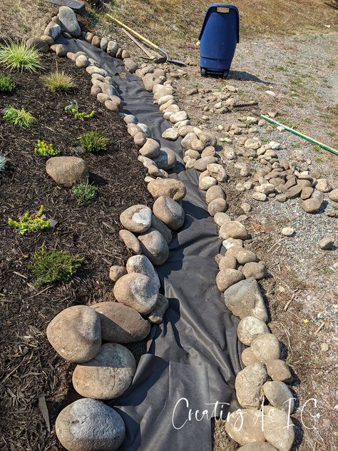 How To Build A Dry Creek Bed For Drainage, Dry Beds For Drainage, Dry River Bed Front Yard, Backyard Dry Creek Bed, Stone River Garden Dry Creek Bed, River Rock Dry Creek Bed, Well Head Landscaping, Diy Dry Stream Bed, Yard Creek Landscaping