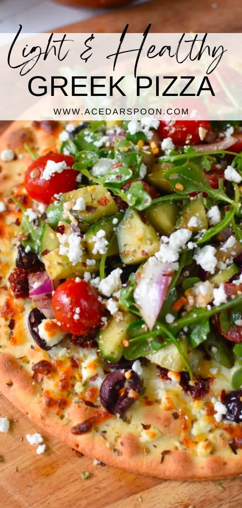 Spice up your lunch or dinner routine with this flavorful and healthy Greek pizza packed with all of your favorite ingredients! This easy meal uses pre-made pizza dough, feta cheese, sun-dried tomatoes, olives, arugula and other herbs to create a delicious and colorful dish. Whether you're looking for a light lunch or an easy dinner meal for the family, this Greek pizza is sure to be a hit! Greek Pizza Recipe, Mediterranean Pizza, Greek Pizza, Mediterranean Recipes Healthy, Mediterranean Diet Recipes Dinners, Pizza Base, Mediterranean Diet Meal Plan, Easy Mediterranean Diet Recipes, Healthy Pizza