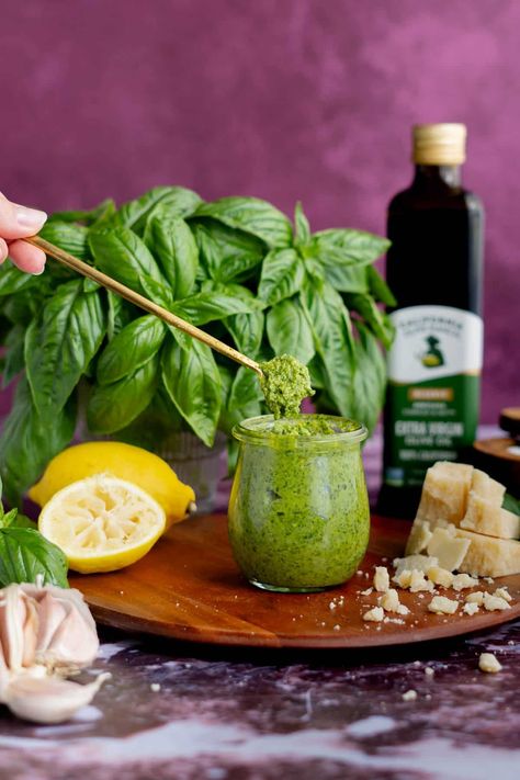 This homemade basil lemon pesto recipe combines fresh basil, zesty lemon, and a generous amount of parmesan cheese for a fresh and flavorful twist on the classic sauce. It’s perfect for use as a pasta sauce, brushing on pizza, or as a condiment. Make a double batch and freeze some for later use! Lemon Pesto Sauce, Lemon Pesto Pasta, Lemon Basil Pasta, Italian Appetizers Easy, Italian Appetizer, Basil Pesto Sauce, Lemon Pesto, Garlic Uses, Basil Recipes