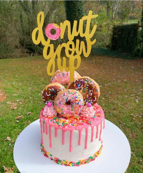 Donut Inspired Cake, Cupcake Donut Cake, Donut Grow Up Themed Birthday Party, Donut Grow Up Smash Cake, 1st Birthday Party Donut Theme, Donut Grow Up Birthday Cake, Donut Party Cake Ideas, 1st Birthday Doughnut Theme, Doughnut Party Decorations