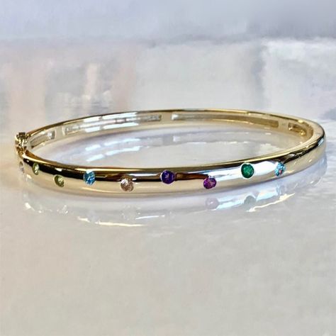 bracelet has genuine stones (blue zircon, amethyst, diamond, topaz, peridot and garnet 14k Gold Bangle Bracelet, Gemstone Bangle Bracelets, Gemstone Bangle, Gold Bangle Bracelet, Gold Bangle, Blue Zircon, Epiphany, Custom Bracelets, Italian Charm Bracelet