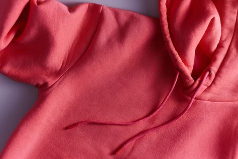 Close-up of pink hoodie. Fold A Hoodie, Konmari Method, How To Fold, Marie Kondo, Hacks Diy, Pink Hoodie, 2 Way, Apartment Therapy, Cleaning Tips