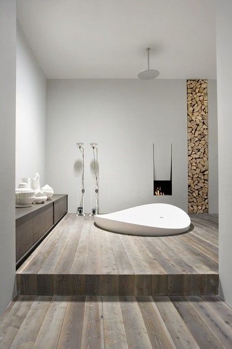 Bathroom Trends: Maximizing Impact With Minimalist Design Bathtub Designs, Drømme Bad, Minimalist Bathroom Design, Bathroom Fireplace, Bad Inspiration, Standing Bath, Freestanding Bathtub, Bad Design, Wooden Floor