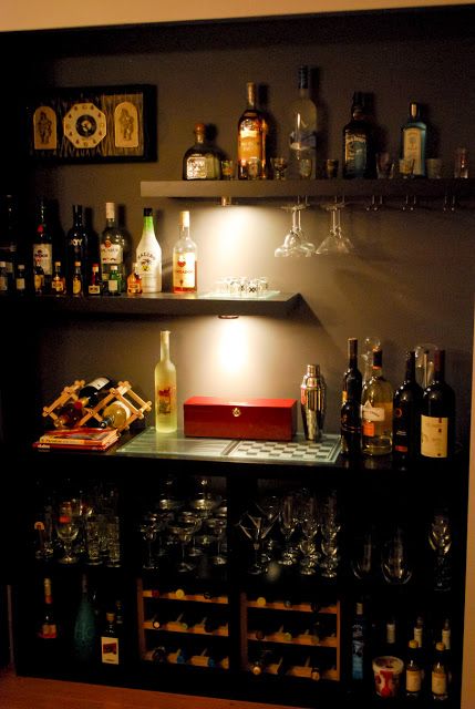 Materials: 4x4 Expedit, Lack shelves, Hutten, Counter lamps, wine glass holdersDescription: Not the first Expedit bar hack, but hopefully you all will still app Lack Shelf, Bar Deco, Bar Mini, Bar In Casa, Bar Sala, Home Bar Designs, Ikea Hackers, Mini Bars, Dry Bar