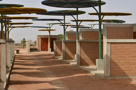 African Market, Brick Architecture, Canopy Design, Thermal Comfort, Metal Canopy, Abstract Geometric Art, Brick Facade, Contemporary Living Spaces, Ground Floor Plan