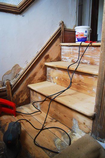 One Year Later: What Our Painted & Stained Staircase Looks Like Now Painting Wooden Stairs, Staining Stairs, Stained Staircase, Stairs Nook, Victorian Stairs, Stairs Skirting, Painted Staircase, Under Stairs Nook, Redo Stairs