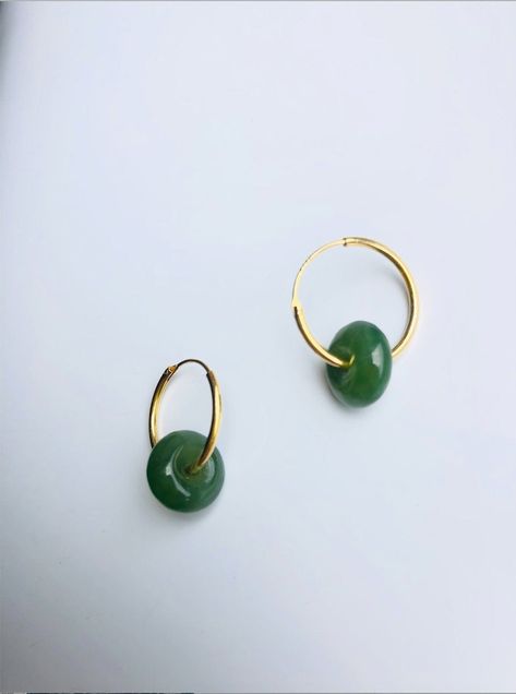 A stunning pair of modern-look dark green jade donut drop earrings.Simple and elegant. Hand-made from the premium 100% natural and real green nephrite green jades circle and 925 sterling silver plated with 18K gold in a minimalistic style. The stylish gold and green minimalistic design is great for your day-to-day classic wear or special occasions. Perfect as a gift for yourself or your loved ones. Some highlights of this pair of eye-catching genuine dark green jade drop earrings are: *High-qual Green Jade Jewelry, Jade Hoop Earrings, Jade Jewellery, Jade Jewelry Design, Earrings Outfit, Jade Earrings, Jade Necklace, Jade Jewelry, Green Earrings