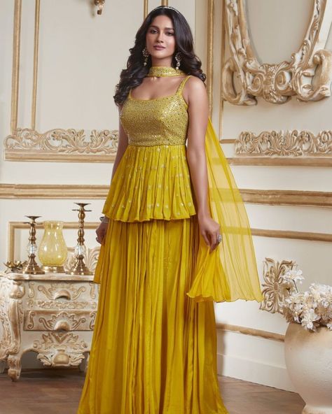 We have curated some head-turning Haldi dresses for you to serve the looks. Take notes & bookmark the ones you love most to own the Haldi ceremony like a queen B! #Haldi #Yellow #Suit #Sharara Sharara For Haldi, Yellow Sharara For Haldi, Haldi Dresses, Haldi Look, Sarara Dress, Yellow Sharara, Punjabi Sharara, Suit Anarkali, Haldi Ceremony Outfit