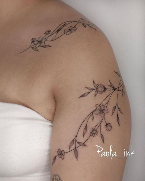 fine line tattoo vines • Instagram Types Of Vines Tattoo, Ivy Tattoo Fine Line, Vine On Shoulder Tattoo, Vine Tattoos For Women On Arm Half Sleeves, Floral Shoulder Wrap Tattoo, Vine Tattoos Shoulder, Lily Vine Tattoo, Plant Vine Tattoo, Flower Vines Tattoo