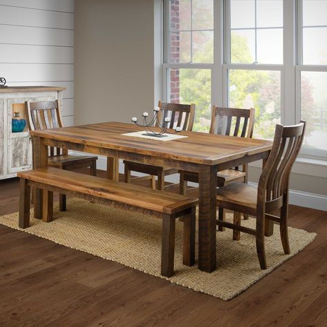 This rustic farmhouse table is available in rustic Oak Reclaimed Barn wood. Shown in Clear/w/Van Dyke Brown Glaze in the 72" length and the 60" Prairie Bench & Prairie ChairBuy the set as shown here. Amish Handcrafted in Pennsylvania.30"h x 42"w. Available in 60", 72", 84", or 96" lengthsView StainsMain Color is Ba Rustic Lodge Kitchen, Barnwood Dining Table, Reclaimed Kitchen, Rustic Dining Set, Rustic Farmhouse Dining Table, Reclaimed Dining Table, Farm Dining Table, Barnwood Table, Real Wood Furniture