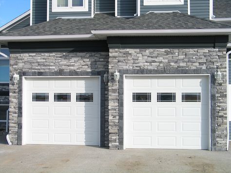 Frontier Ledge - Glacier | by Kodiak Mountain Stone | www.KodiakMountain.com | #Lethbridge #renovation #yqlhomes Grey Garage Doors, Gray Garage, Metal Garage Doors, Carriage House Doors, Garage Door Windows, Modern Garage Doors, Garage Door Types, Steel Garage Doors, Overhead Garage Door