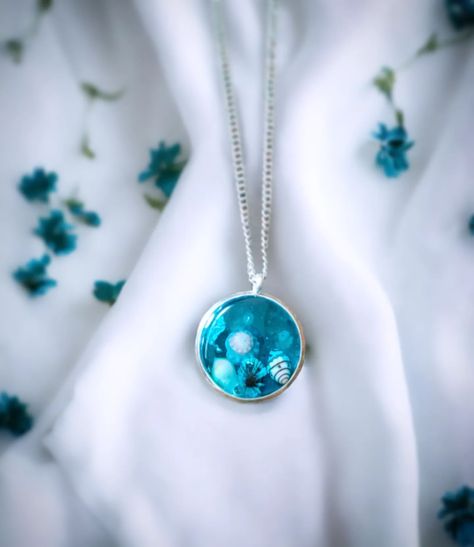 🏖️Ocean🌊themed pendant crafted by hand with intricate details🐚 #handmadejwellery #supportsmallbuissness #resinart #oceantheme Ocean Themes, Intricate Details, Resin Art, Pendant, On Instagram, Quick Saves, Instagram, Art