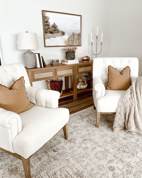 Before moving this dresser into our entryway hallway, I styled it in the front foyer. I loved the simplicity and serenity of the Neutral tones and natural textures create a calming entryway that invites warmth and peace from the moment you step inside. 🌟The first two pictures are what I styled before I decided to switch up the living room. The last three are what I ended up doing. 🤔What are your thoughts? Do you like the final result? Which one is your favorite? #HomeDecorInspo #Neutral... Subtle Disney Living Room, Entryway With Chair Ideas, Neutral Foyer Entryway, Foyer Living Room Combo, Entry Way Sitting Area Entrance, Entry Way Seating Area Entrance, Foyer Sitting Area Entryway, Two Accent Chairs In Living Room, Walk Into Living Room From Front Door