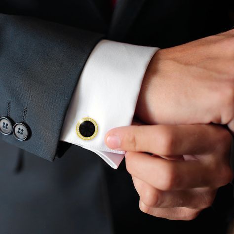 Vintage style meets the VIP room in these cufflinks. Genuine onyx gemstones are set by hand onto classic round 18 K gold cufflinks. Sparkling diamonds add unexpected flash while perfectly complementing the natural gemstones. 18k gold White diamond pavé Total diamond carat weight: 0.60 Genuine black onyx Anti-tarnish finish for long lasting wear Cufflinks width 16mm Packaged in a wood lacquered box, perfect for gifting and display Style # G1573YGOX Matching tuxedo studs available Tuxedo Studs, Vip Room, Gold Cufflinks, Diamond Carat, Sparkle Diamonds, Pave Diamonds, Black Onyx, White Diamond, Natural Gemstones