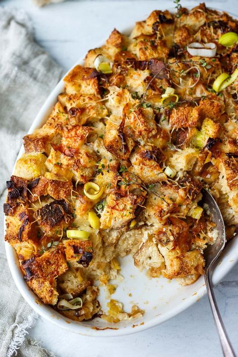 This Savory Bread Pudding with leeks and gruyere is as cozy as it gets!  A delicious and comforting side dish or vegetarian main- perfect for special dinners or the holiday table. (Adapted from Thomas Keller's recipe- but a little lighter!) Savory Pudding, Leek Bread Pudding, Leek Stuffing, Seafood Bread Pudding, Leek Stuffing Thanksgiving, Leek And Mushroom Bread Pudding, Savory Bread Pudding, Savory Bread Pudding Thanksgiving, Bread And Celery Stuffing