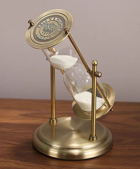 • vintage • timer • dark academia • desk decor • room decor • table decor • desk toy • amazon • Embossed White Sand Metal Glass Hourglass Timer. Great for vintage rooms, tables, desks, and bookshelf decor. Available in a copper frame and embossed lettering. Click here and see our other table top timer designs! #amazonfinds #shopamazon #deskdecor #roomdecor #decorideas #vintage #hourglass #darkacademia #academia #gamenight #desktoy #giftidea Hourglass Sand Timer, Hourglass Timer, Sand Clock, Hourglasses, Sand Timers, Clock Gift, Decoration Kitchen, Office Desk Decor, Vintage Room