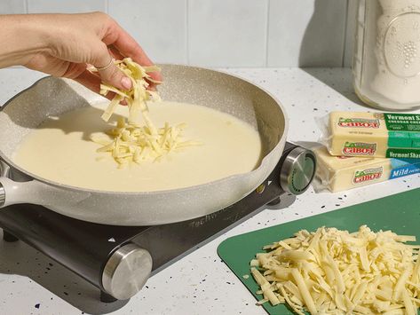 How to Melt Cheese Like a Pro – Cabot Creamery How To Melt Cheese, Melted Cheese Dip, Melted Cheese Sauce, Baked Pork Loin, Liquid Cheese, Cheese Sauces, Chedder Cheese, Cheese Dinner, Cheddar Cheese Sauce