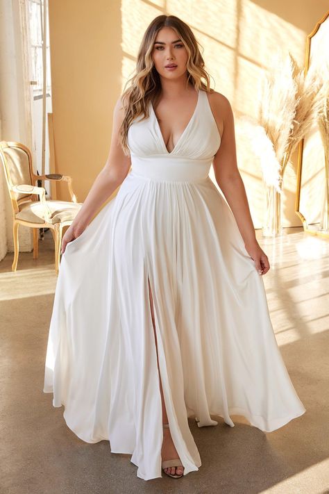 The long A-line bridal gown is perfect for your romantic wedding dreams. With its soft cup inserts that help keep you comfortable, this dress is just right for your special day! If you're looking for an affordable yet beautiful option, we have what you need! Fabric : Satin Length: Full Length Sleeve Style: Sleeveless Color: Off White Sizes : 14, 16, 18, 20, 22, 24 Fully Lined Occasion : Wedding DressesVendor: Cinderella DivineStyle: CD7469WW Beach Elopement Dress Plus Size, Plus Size Flowy Wedding Dress, Boho Reception Dress, Lesbian Wedding Dress, Plus Size Beach Wedding Dress, Size 20 Wedding Dress, Curvy Bride Dress, Beach Elopement Dress, Wedding Rehearsal Dress