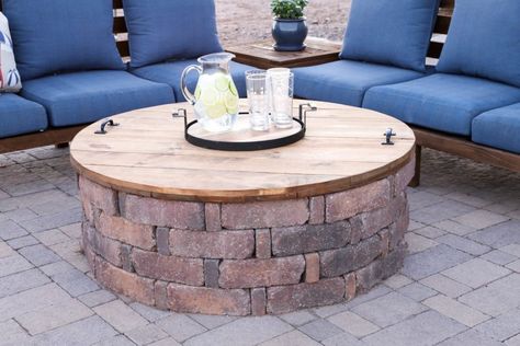 Learn how to turn your unused fire pit into a table with a DIY fire pit cover. This fire pit cover only uses a few tools and is a perfect project for beginners and experienced DIYers alike. Diy Fire Pit Cover, Sand Fire Pits, Fire Pit Table Cover, Fire Pit Table Top, Make A Fire Pit, Brick Patio, Wood Fire Pit, Round Fire Pit, Fire Pit Cover