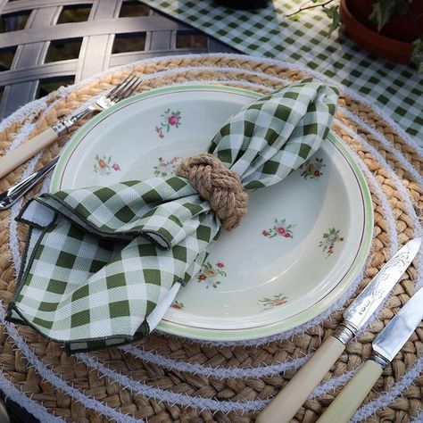 Table linens in this Evergreen Gingham add the perfect rustic feel to your tablescape!⁠ ⁠ #tablescape #evergreen #gingham #alfresco #rusticdining #rusticliving #napkinfolding #napkinlaying #placesetting #rusticwedding #tablelinens #newcollection #fabricdesign #furnishings Gingham Table Setting, Gingham Napkins Wedding Table, Yellow Gingham Table Setting, Sage Green Gingham Fabric, Gingham Napkins, Napkin Folding, Rustic Living, Rustic Dining, Rustic Feel