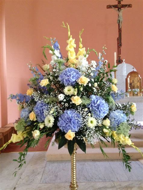 Blue Yellow White Flower Arrangement, Blue Floral Table Arrangements, Hydrangea Altar Arrangement, Blue Hydrangea Flower Arrangements, Blue And Yellow Flower Arrangements, Altar Flower Arrangements, Alter Decorations, Yellow Flower Arrangements, Altar Arrangements