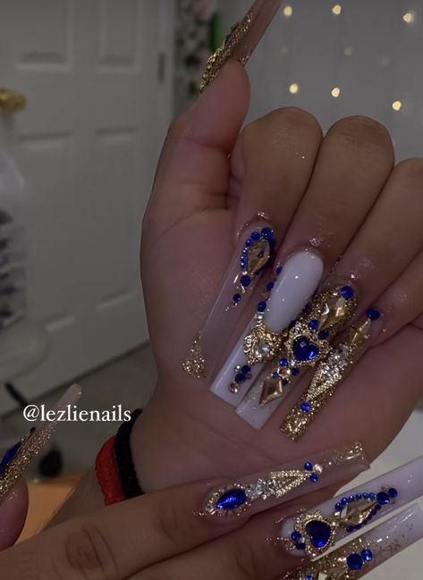 Prom Nails Acrylic Rhinestones, Oshun Inspired Nails, Extra Birthday Nails Virgo, Dark Blue Quinceanera Nails, Cute Birthday Nails Coffin Long, Wedding Blue Nails, White Long Nails With Rhinestones, Coffin Acrylic Nails With Rhinestones, Gold And Royal Blue Nails